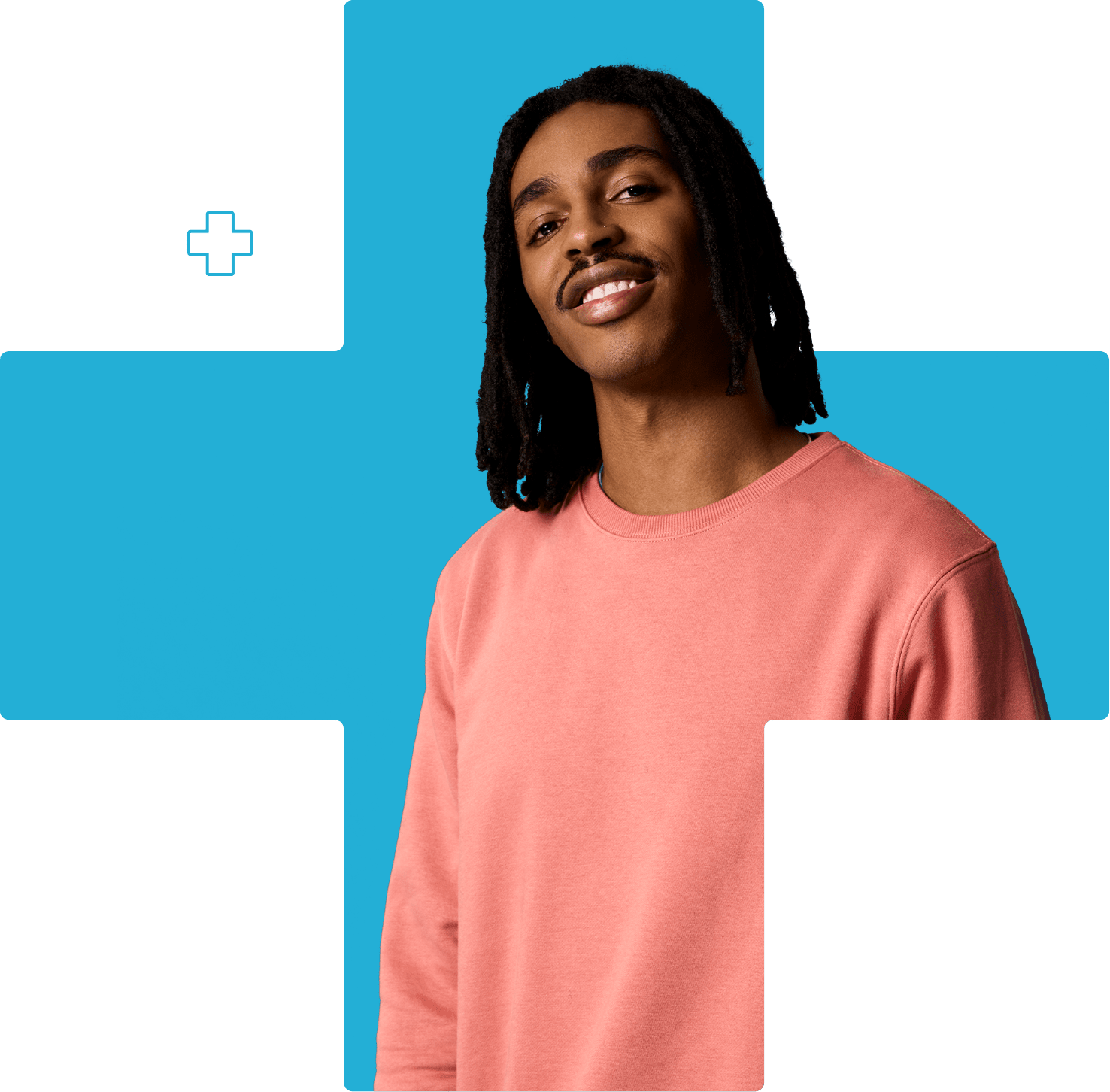 man in salmon shirt smiling with background plus symbol